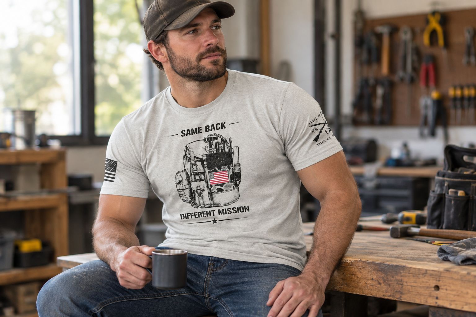 Man wearing a transition-themed sand t-shirt in a civilian workshop