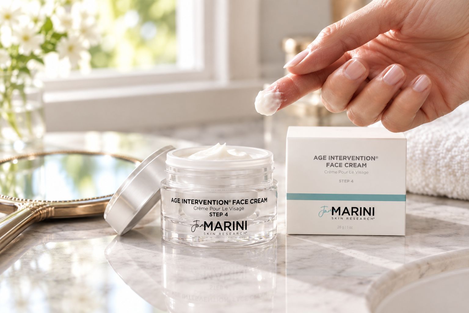 Jan Marini Age Intervention Cream jar open on a bathroom counter