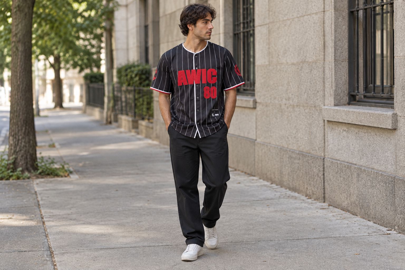 A baseball jersey worn with plain dark trousers and simple shoes