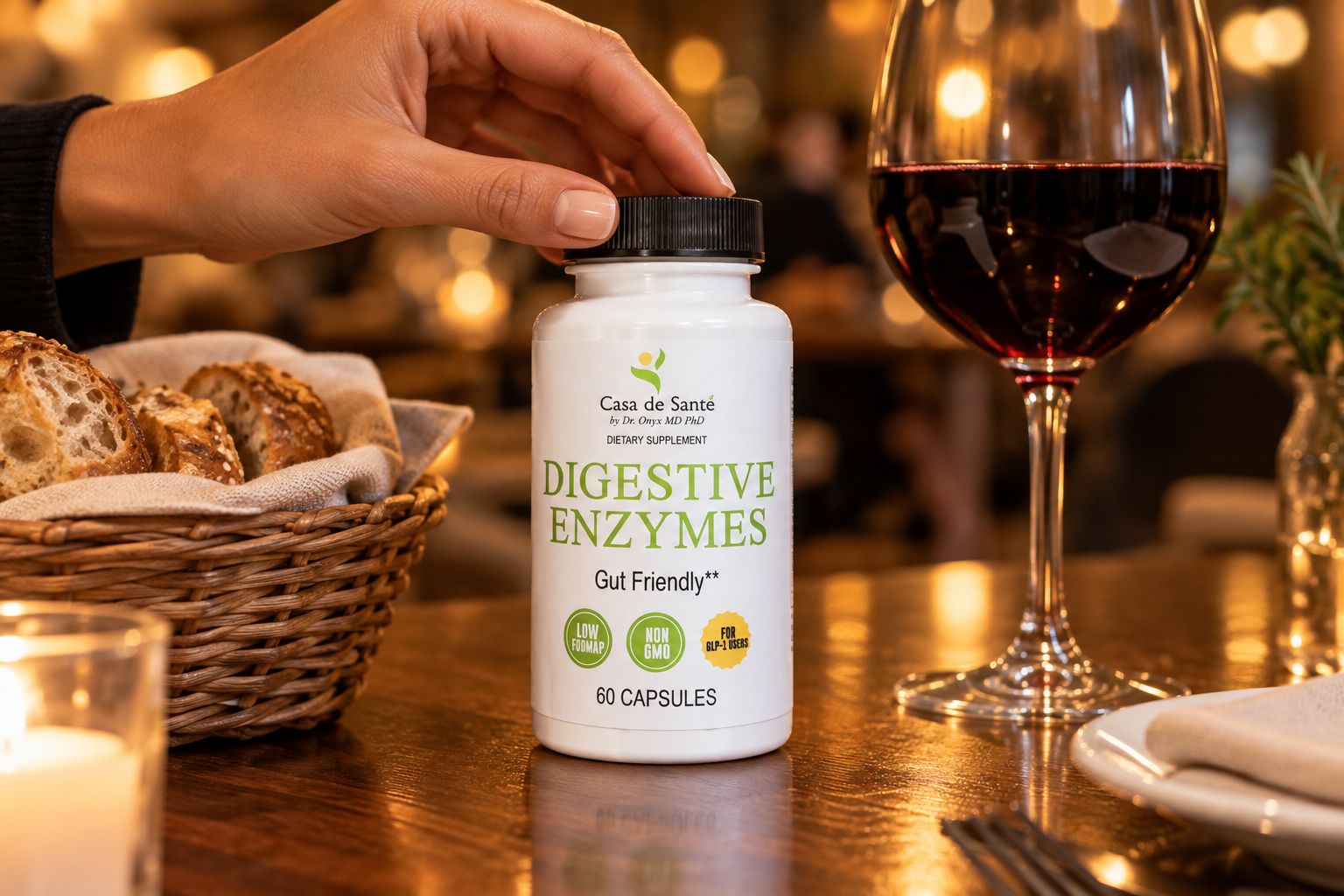 Bottle of digestive enzyme capsules on a restaurant table beside a glass of wine