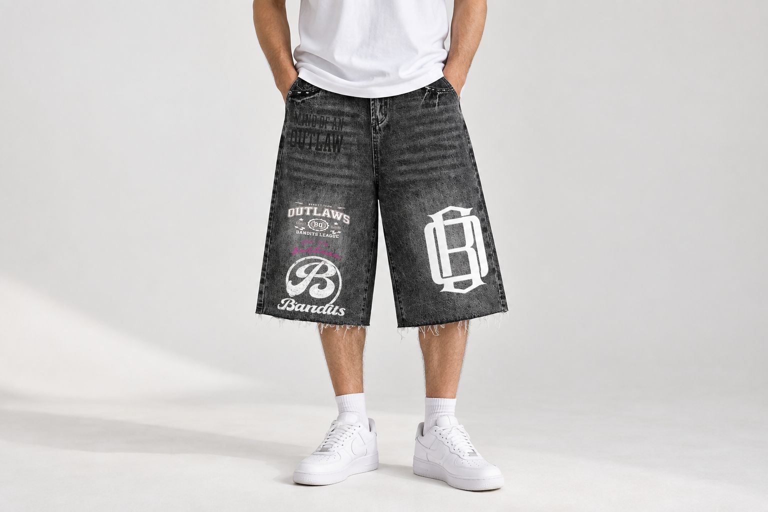 Denim shorts worn with a plain T-shirt and sneakers to show outfit proportions
