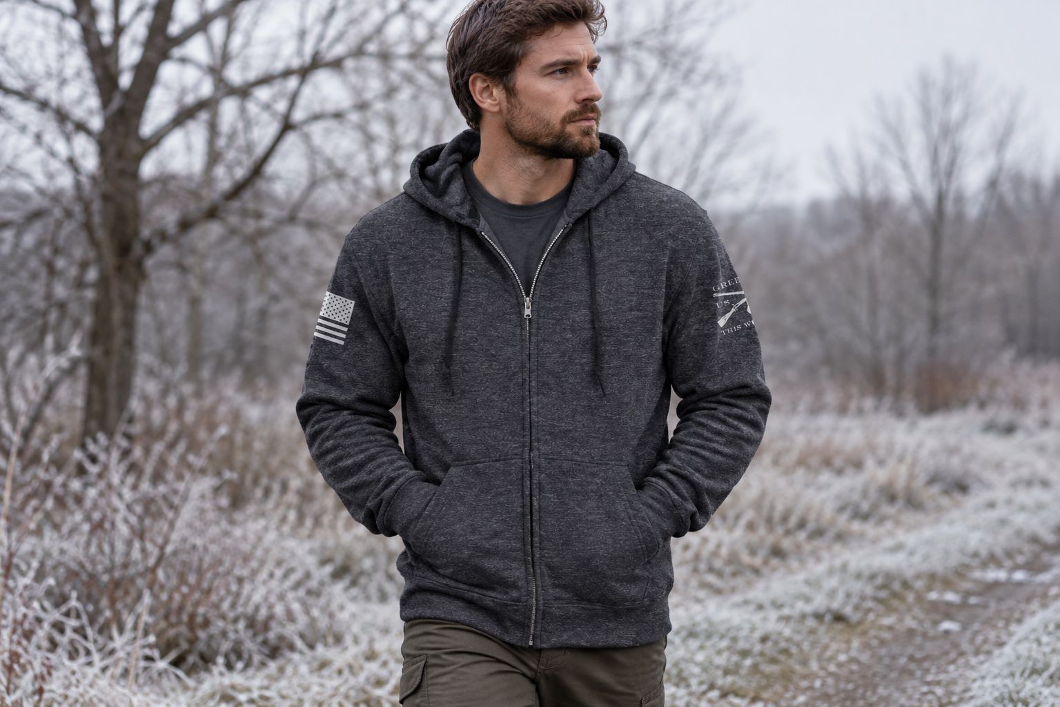 Man wearing a full-zip hoodie outdoors on a cold day