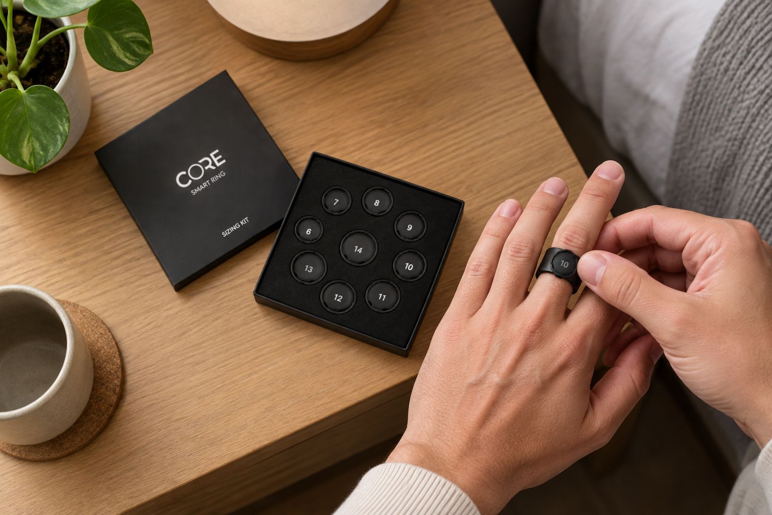 A person trying a ring sizing piece beside the sizing kit