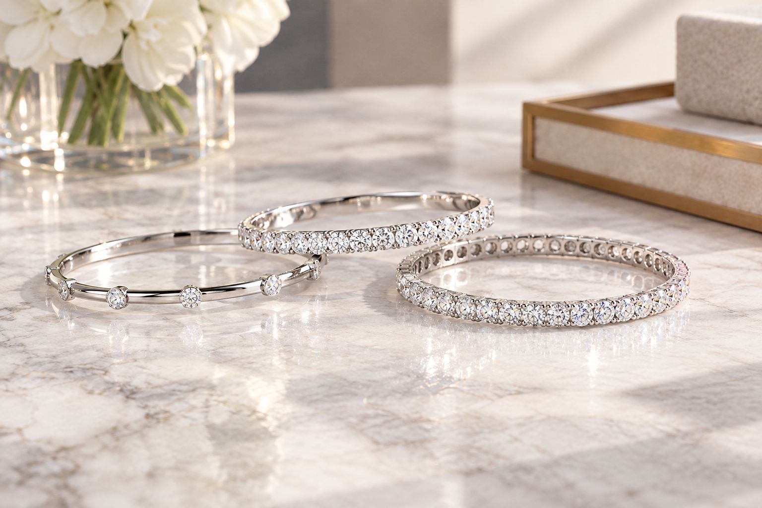Three generic diamond bangles showing isolated accents, front coverage, and all-around coverage