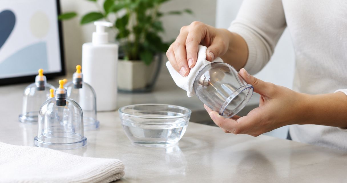 How do you clean a cupping device?
